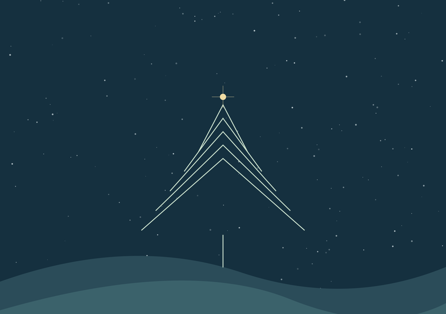 A Christmas tree of light in a winter landscape.